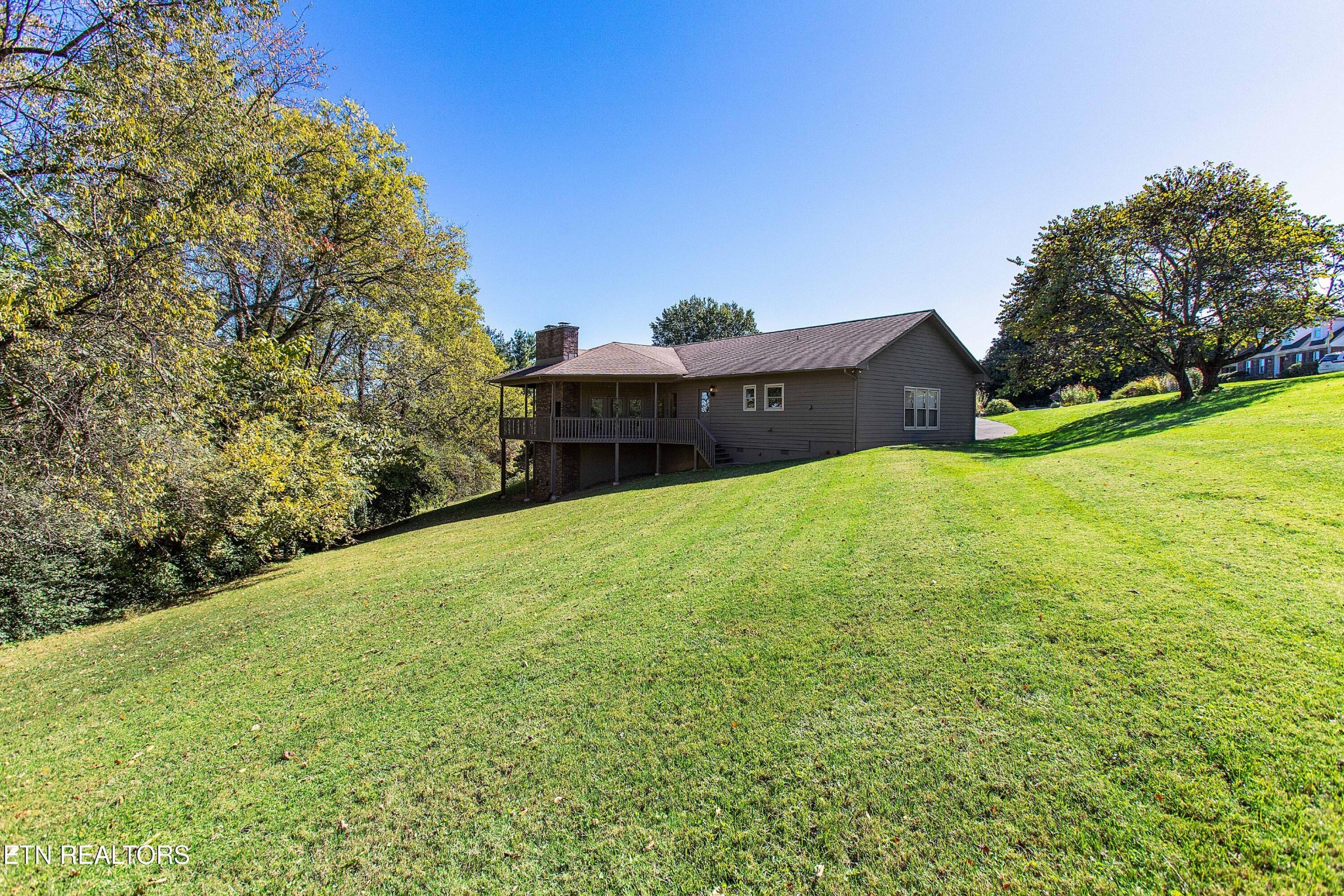 103 Farmington Place Clinton, TN 37716 - Photo 40 of 40 a view of a large body of water with a building in the background