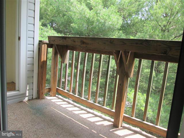 15 Beagle Run, Unit 98 Baltimore, MD 21236 - Photo 15 of 16 a view of a black and white wall