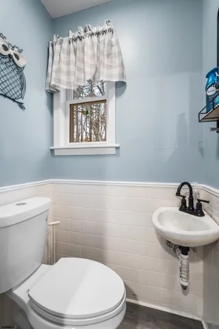 a bedroom with furniture and a book shelf
