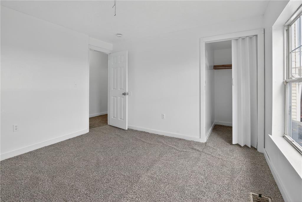 417 Alexander Street McKees Rocks, PA 15136 - Photo 13 of 21 an empty room with windows
