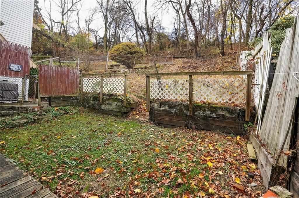 417 Alexander Street McKees Rocks, PA 15136 - Photo 19 of 21 a view of a backyard of the house
