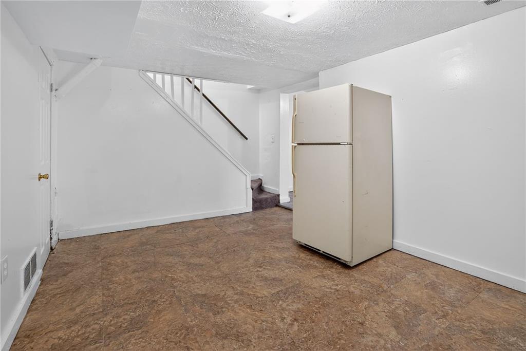 417 Alexander Street McKees Rocks, PA 15136 - Photo 7 of 21 a view of an empty room