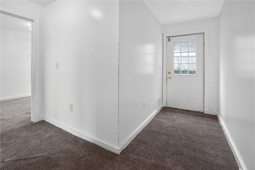 417 Alexander Street McKees Rocks, PA 15136 - Photo 9 of 21 an empty room with windows