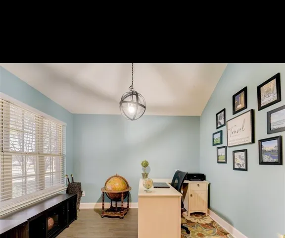 a black and white photo of a living room