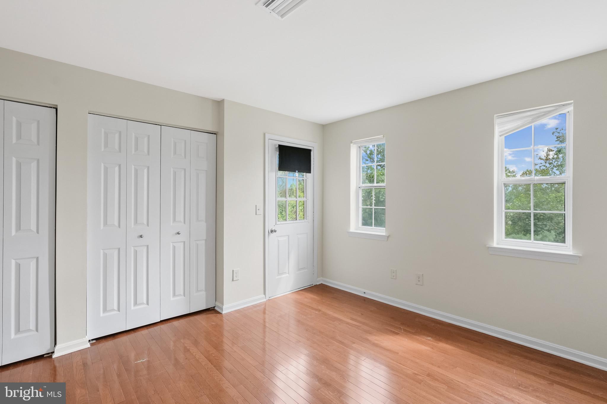 14807 Rydell Road, Unit 203 Centreville, VA 20121 - Photo 16 of 30 Bedroom/access to the balcony