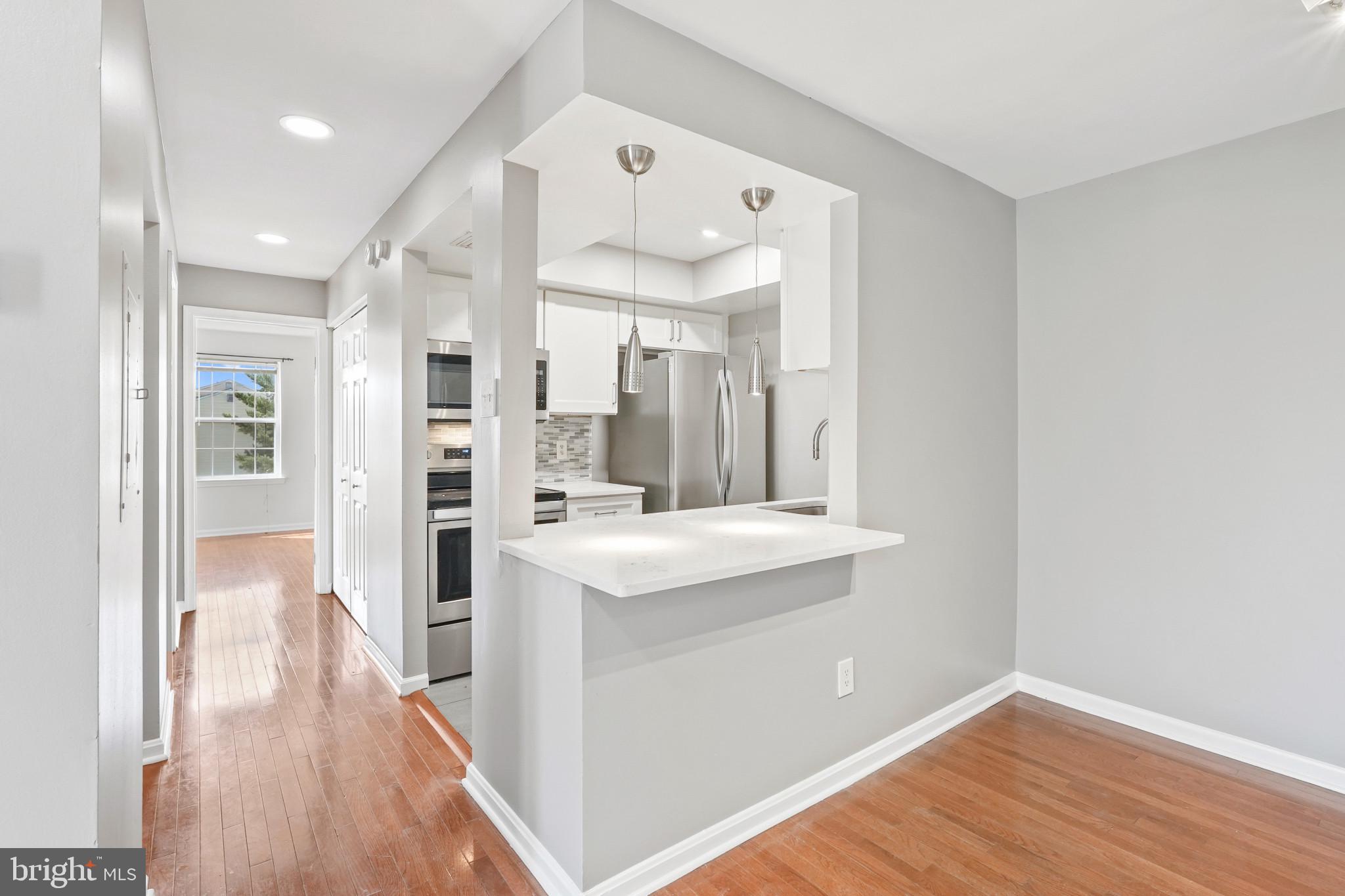 14807 Rydell Road, Unit 203 Centreville, VA 20121 - Photo 10 of 30 Kitchen/hallway overview