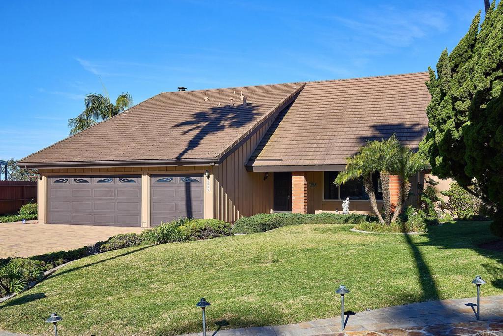 1068 Passiflora Avenue Encinitas, CA 92024 - Photo 1 of 38 front view of a house with a yard