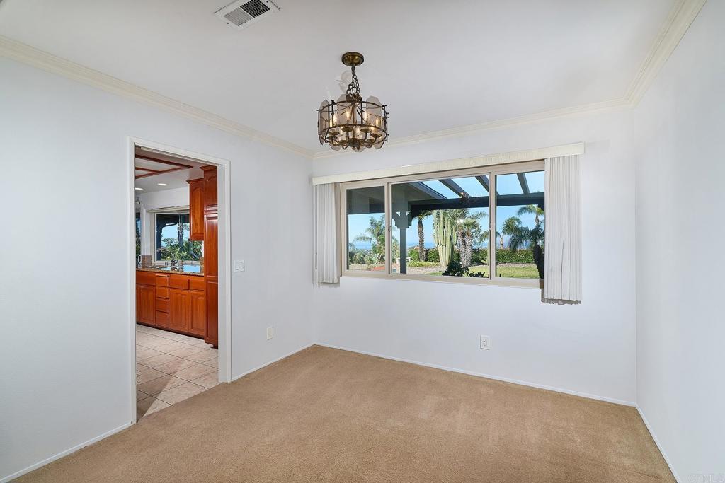 1068 Passiflora Avenue Encinitas, CA 92024 - Photo 17 of 38 an empty room with windows and closet