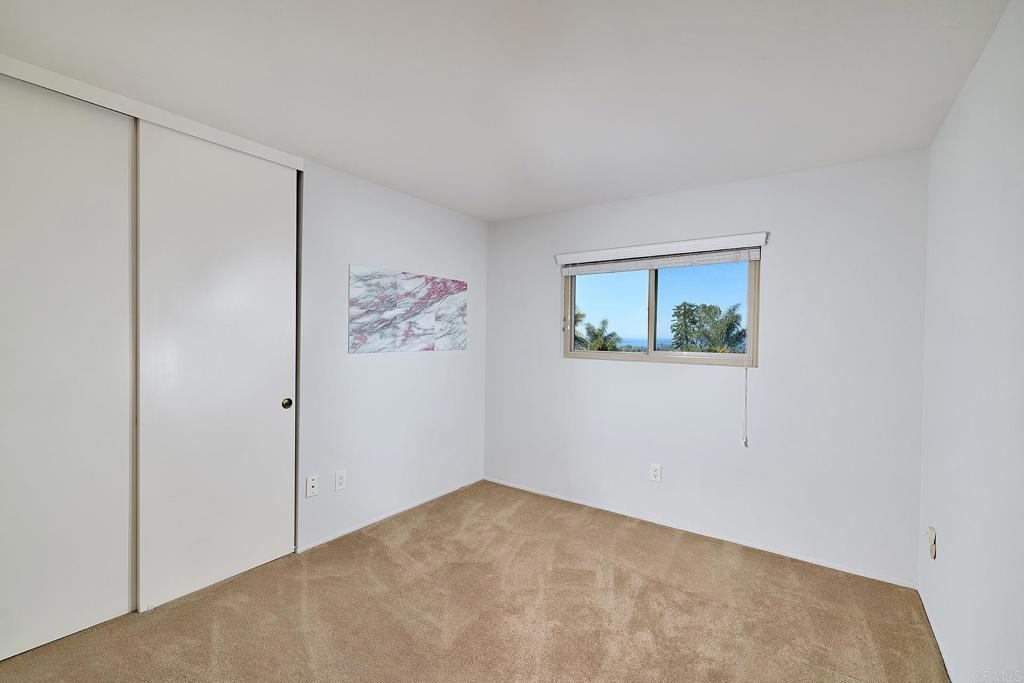 1068 Passiflora Avenue Encinitas, CA 92024 - Photo 23 of 38 a view of an empty room with a window