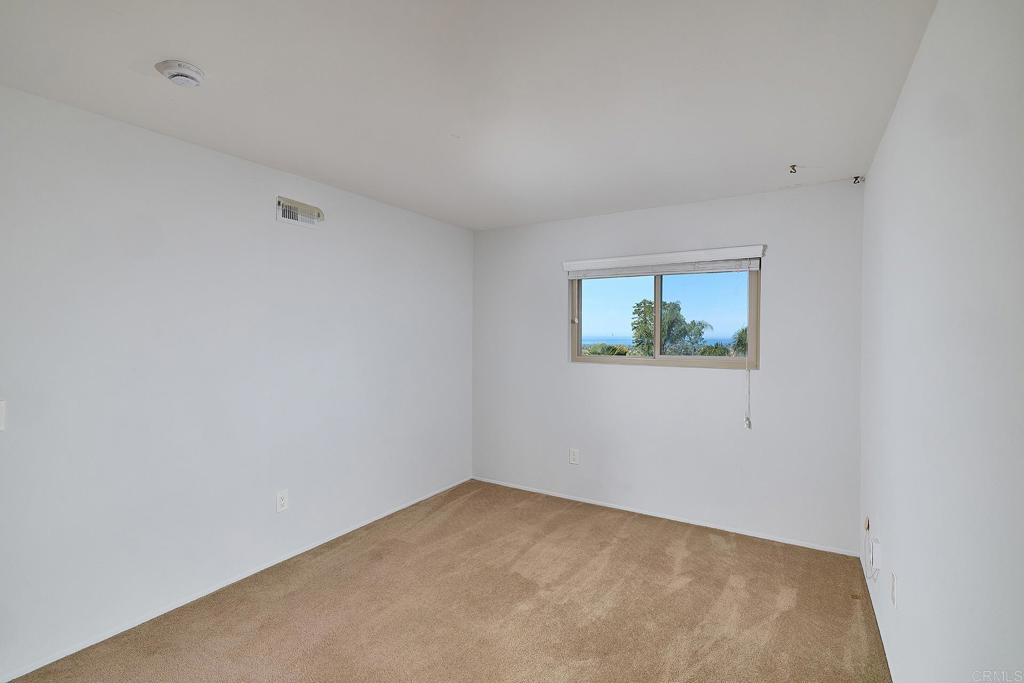 1068 Passiflora Avenue Encinitas, CA 92024 - Photo 24 of 38 an empty room with a window