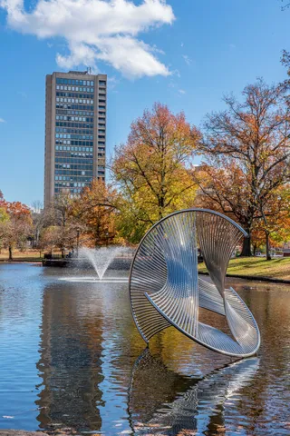 a view of swimming pool from a lake