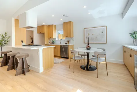 a view of a kitchen with cabinets and counter space