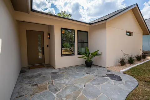 a view of a front door and porch