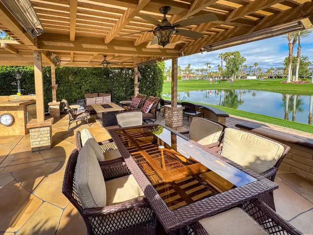 a view of a patio with swimming pool