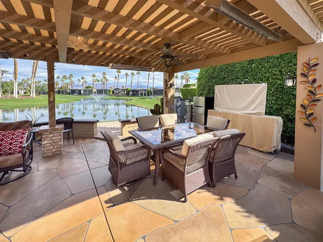 a outdoor space with lots of tables and chairs
