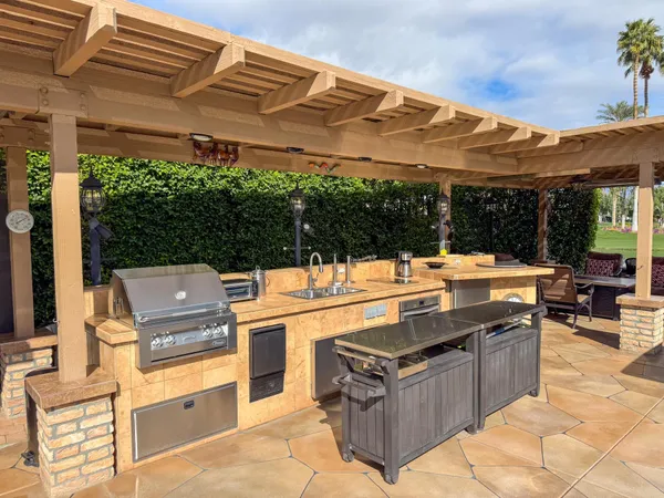a view of a terrace with sitting area