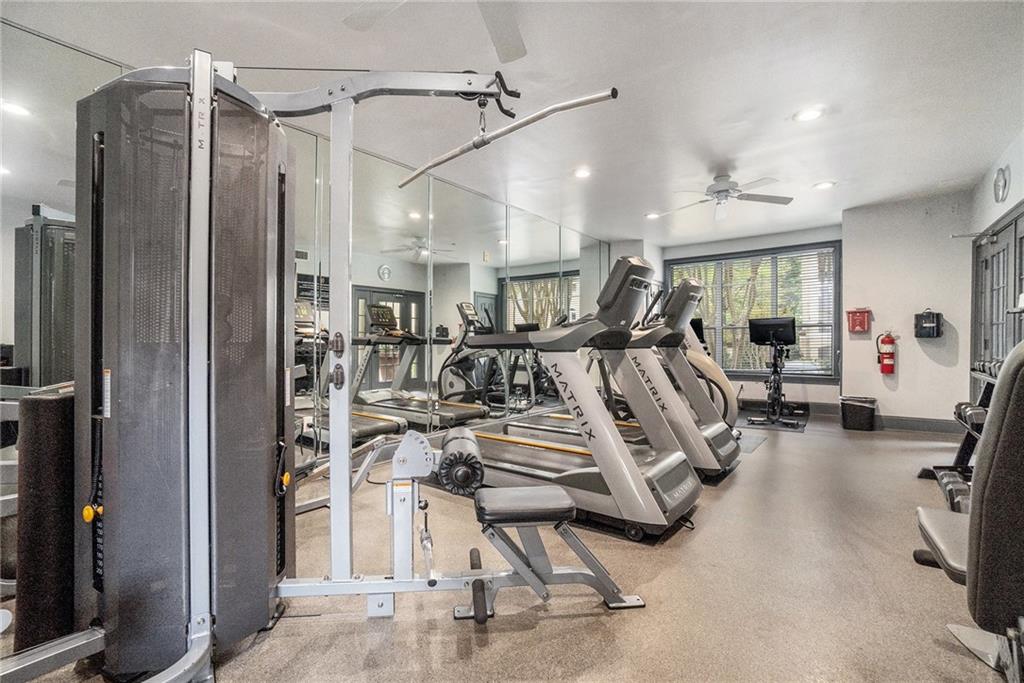 955 Juniper Street Northeast, Unit 3026 Atlanta, GA 30309 - Photo 25 of 32 a view of a room with gym equipment