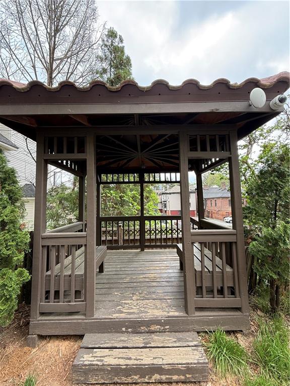 955 Juniper Street Northeast, Unit 3026 Atlanta, GA 30309 - Photo 27 of 32 a view of a chairs and table in the patio