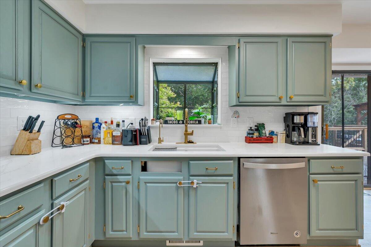 7851 Cedar Edge Road Roanoke, VA 24018 - Photo 12 of 44 a kitchen with appliances cabinets and a sink