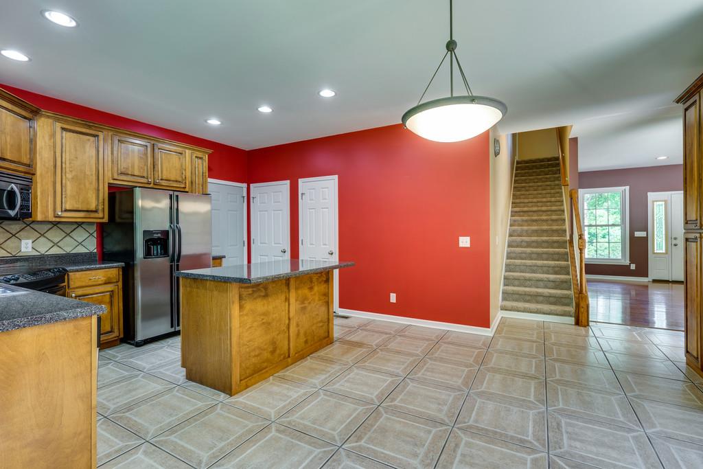 3853 Taylors Store Road Hampshire, TN 38461 - Photo 13 of 30 STAIRWAY TO THE LARGE REC ROOM OVER THE GARAGE