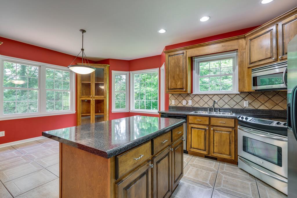 3853 Taylors Store Road Hampshire, TN 38461 - Photo 16 of 30 ISLAND IN THE MIDDLE OF THE KITCHEN AND BREAKFAST NOOK