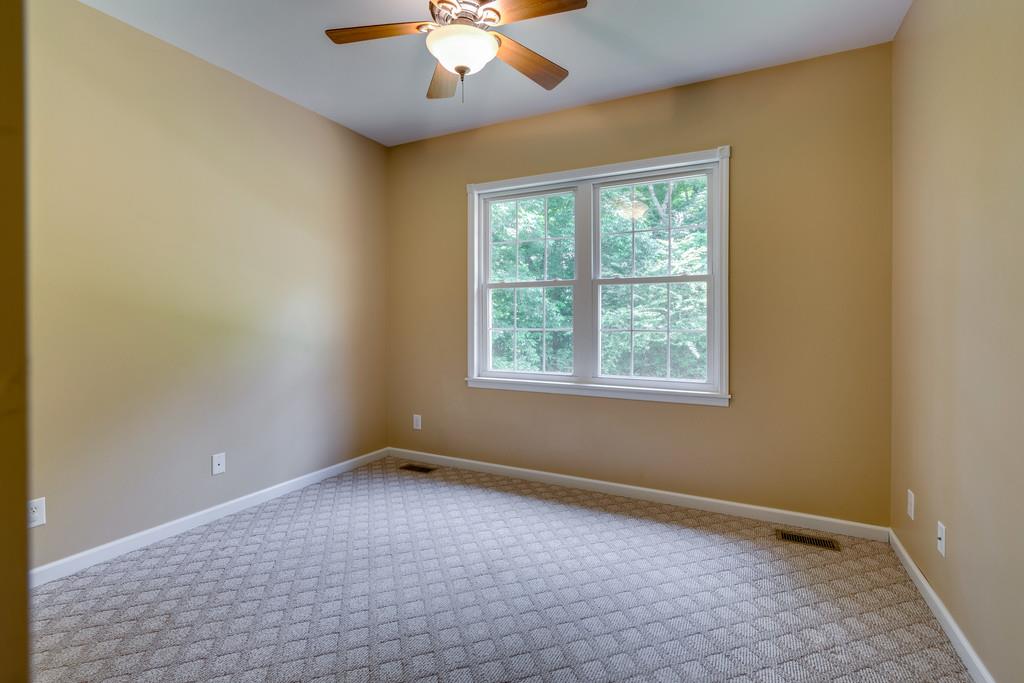 3853 Taylors Store Road Hampshire, TN 38461 - Photo 24 of 30 THIRD BEDROOM WITH DOUBLE WINDOWS AND CARPET ON THE FLOOR