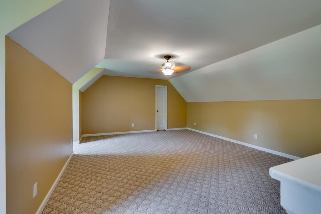 3853 Taylors Store Road Hampshire, TN 38461 - Photo 25 of 30 23x15 REC ROOM OVER THE GARAGE WITH CARPET ON THE FLOOR