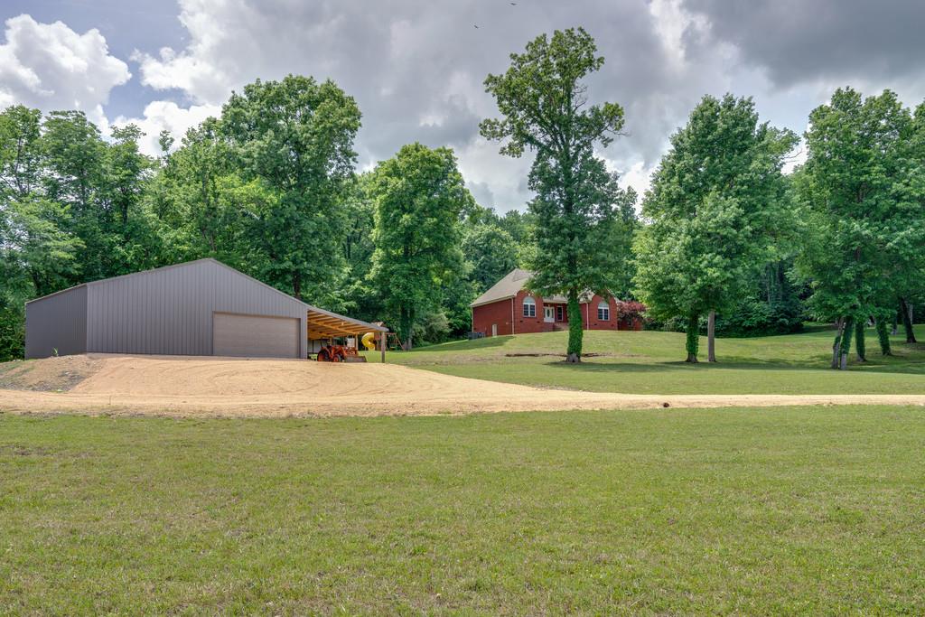 3853 Taylors Store Road Hampshire, TN 38461 - Photo 29 of 30 AMAZING VIEWS OF THE COUNTRY CUSTOM HOME, SHOP AND TALL MATURED TREES THAT SURROUNDS THE PROPERTY