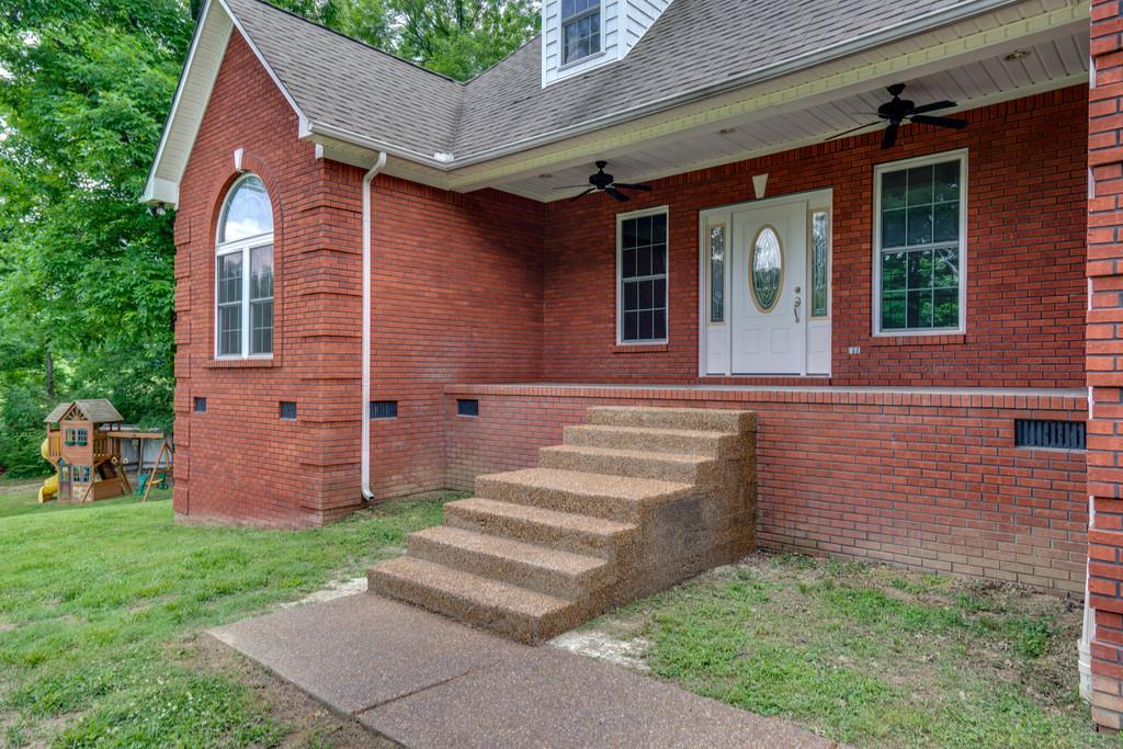 3853 Taylors Store Road Hampshire, TN 38461 - Photo 4 of 30 COVERED FRONT PORCH READY FOR YOUR ROCKING CHAIRS