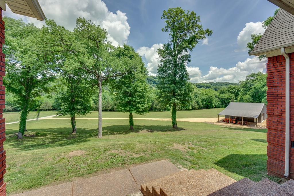3853 Taylors Store Road Hampshire, TN 38461 - Photo 5 of 30 BEAUTIFUL FRONT YARD WITH TALL SHADE TREES ALL AROUND