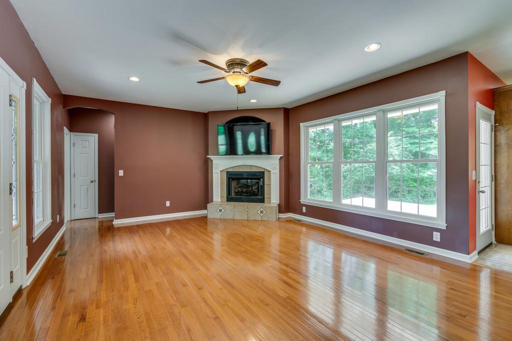 3853 Taylors Store Road Hampshire, TN 38461 - Photo 9 of 30 ENJOY THE WARMTH OF A GAS FIREPLACE IN THE LIVING ROOM WHEN FRIENDS DROP BY