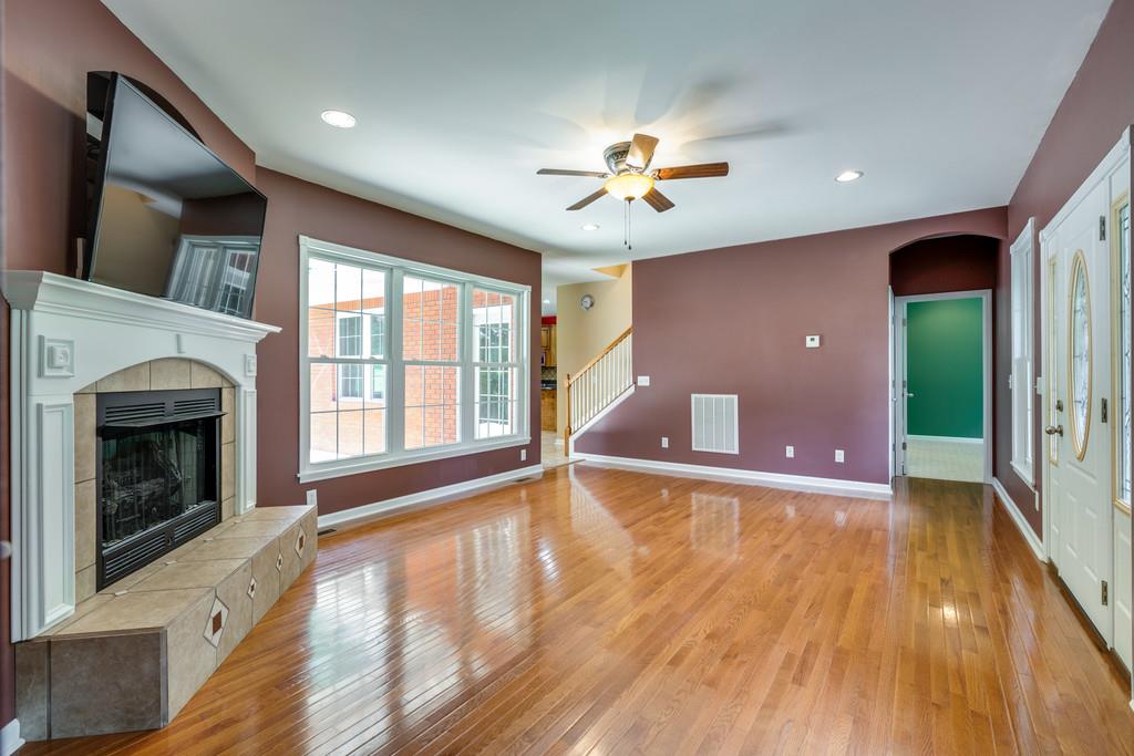 3853 Taylors Store Road Hampshire, TN 38461 - Photo 10 of 30 INVITING LIVING ROOM RADIATES HOSPITALITY AND BEAUTY