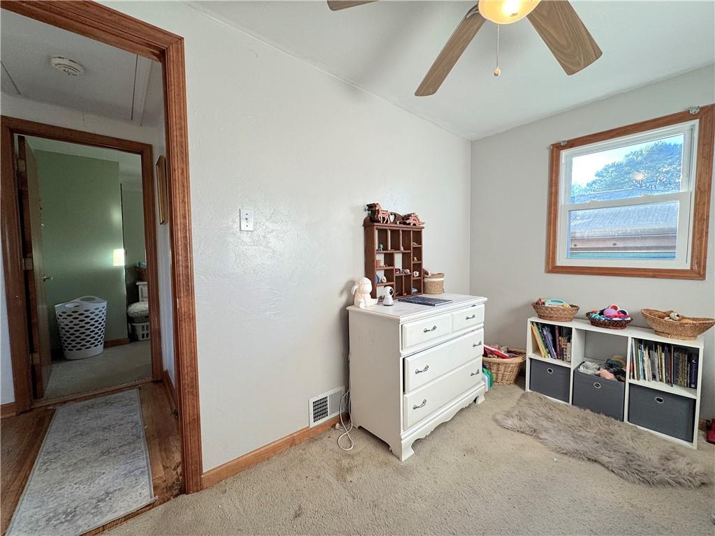 2030 Leo Street Irwin, PA 15642 - Photo 17 of 33 a room with furniture a washer and dryer