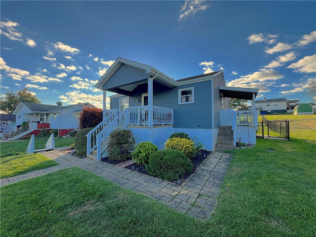 2030 Leo Street Irwin, PA 15642 - Photo 2 of 33 a front view of a house with a yard