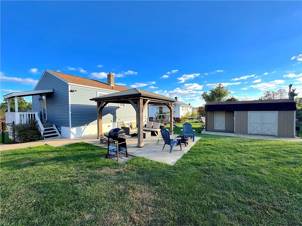 2030 Leo Street Irwin, PA 15642 - Photo 29 of 33 a view of a porch with furniture and garden