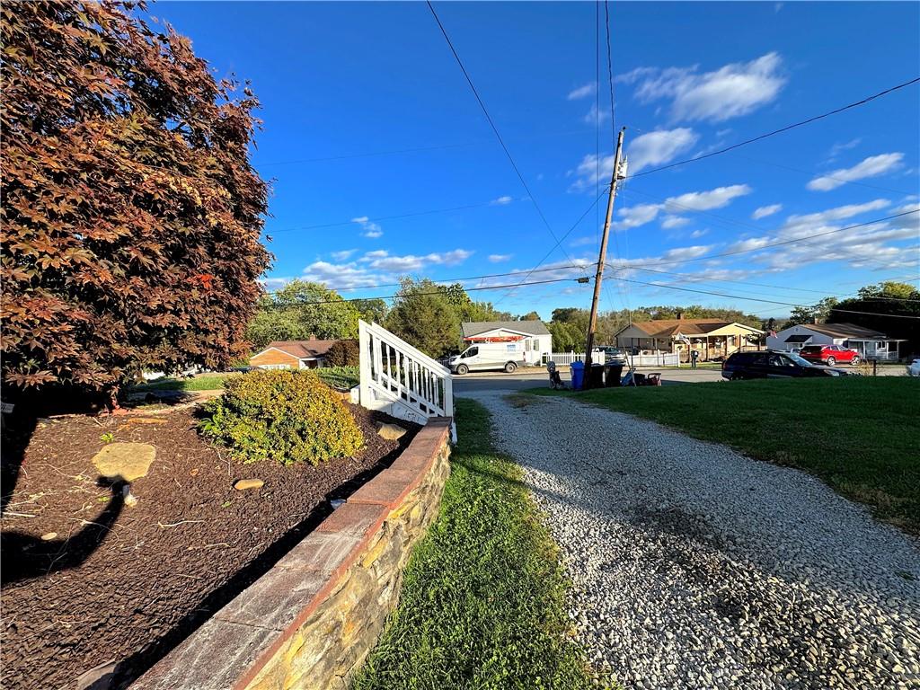 2030 Leo Street Irwin, PA 15642 - Photo 32 of 33 a view of a house with a yard