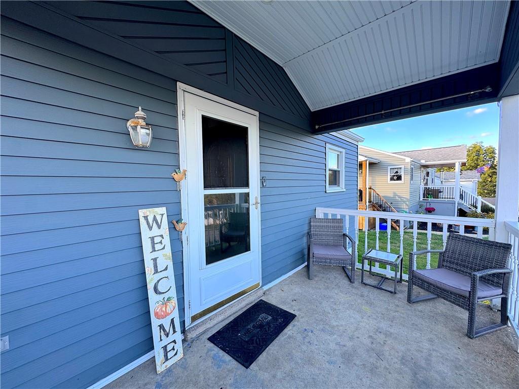 2030 Leo Street Irwin, PA 15642 - Photo 5 of 33 a front view of a house with garden