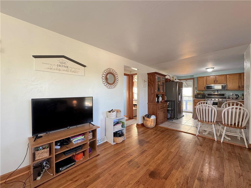 2030 Leo Street Irwin, PA 15642 - Photo 9 of 33 a living room with furniture and a flat screen tv