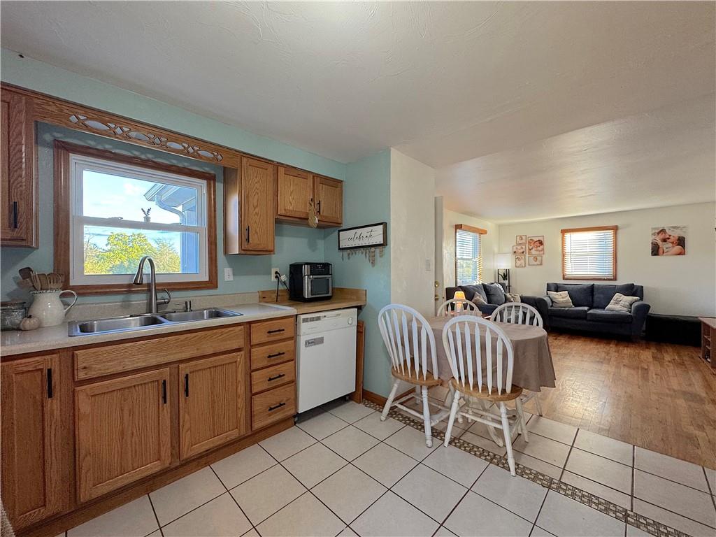 2030 Leo Street Irwin, PA 15642 - Photo 10 of 33 a kitchen with sink cabinets and window