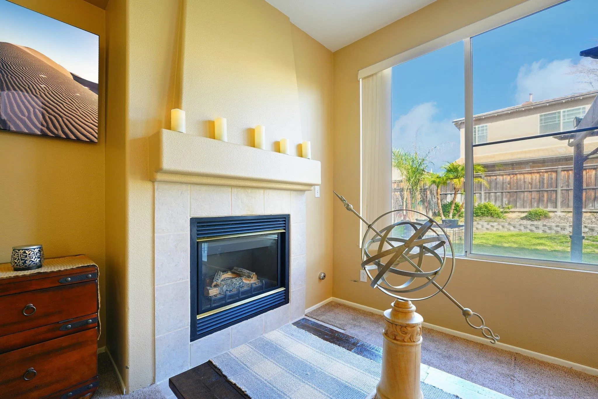 43166 Sereno Drive Temecula, CA 92592 - Photo 22 of 44 a living room with furniture and a fireplace