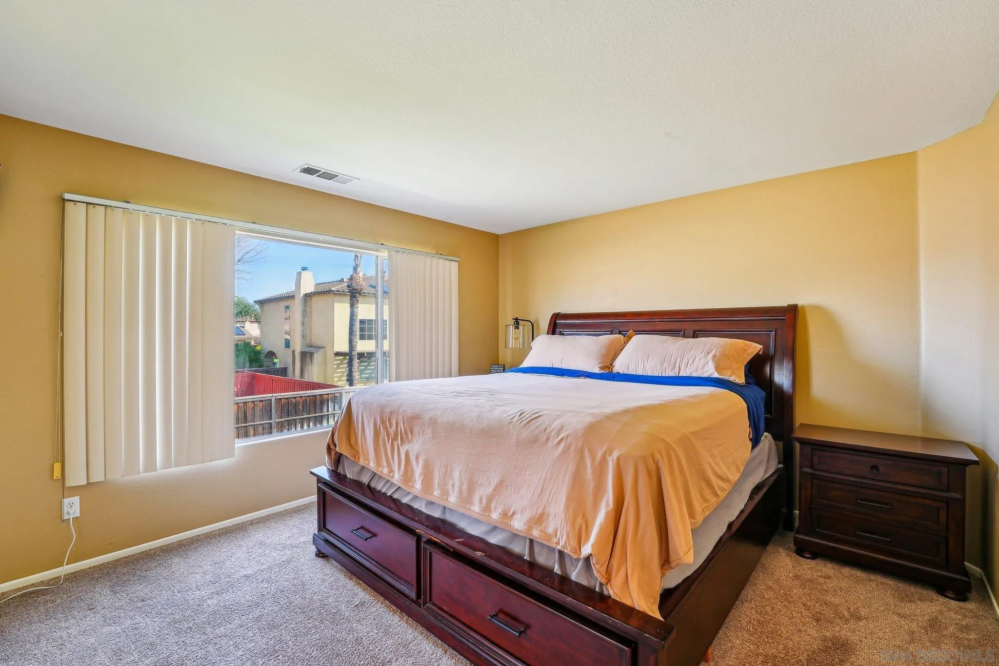 43166 Sereno Drive Temecula, CA 92592 - Photo 27 of 44 a bed sitting in a bedroom next to a window
