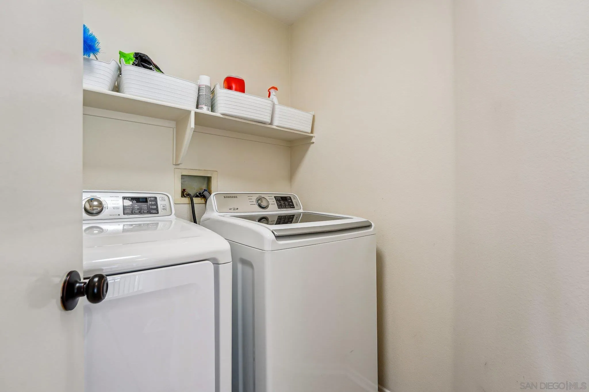 43166 Sereno Drive Temecula, CA 92592 - Photo 28 of 44 a utility room with dryer and washer