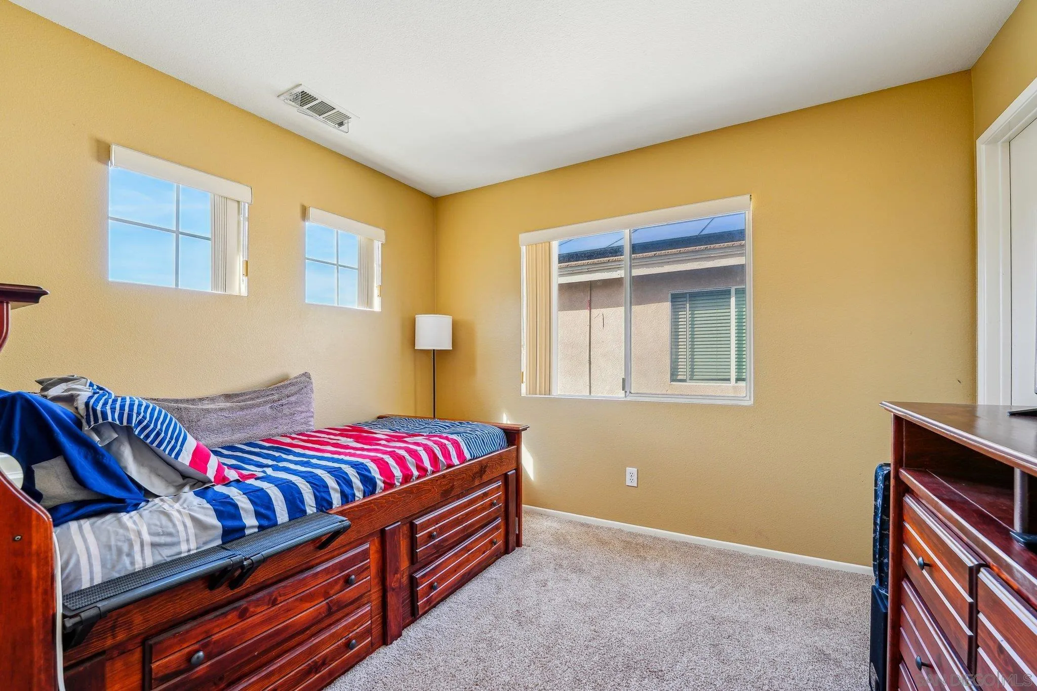 43166 Sereno Drive Temecula, CA 92592 - Photo 29 of 44 a bed room with a bed and a window