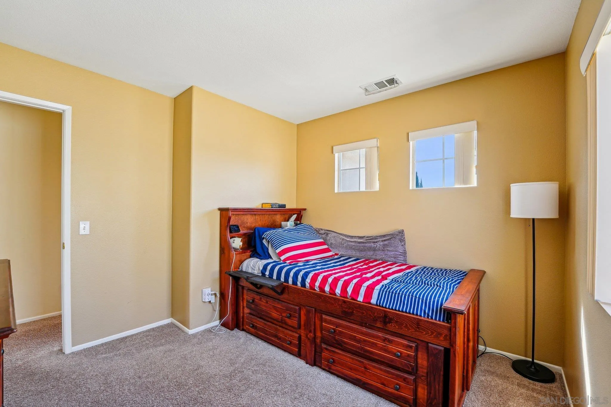 43166 Sereno Drive Temecula, CA 92592 - Photo 30 of 44 a bedroom with a bed and a dresser