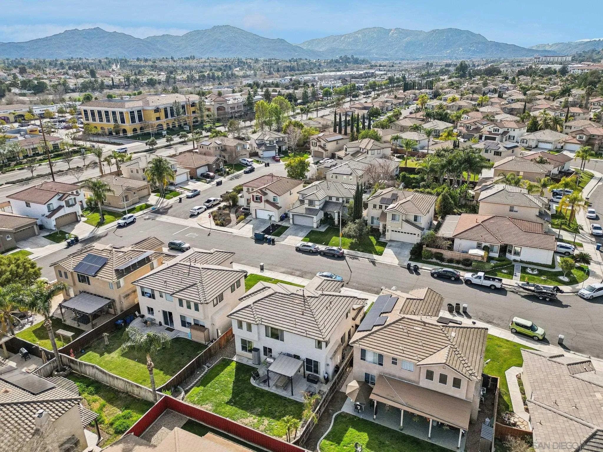 43166 Sereno Drive Temecula, CA 92592 - Photo 40 of 44 an aerial view of residential houses with outdoor space