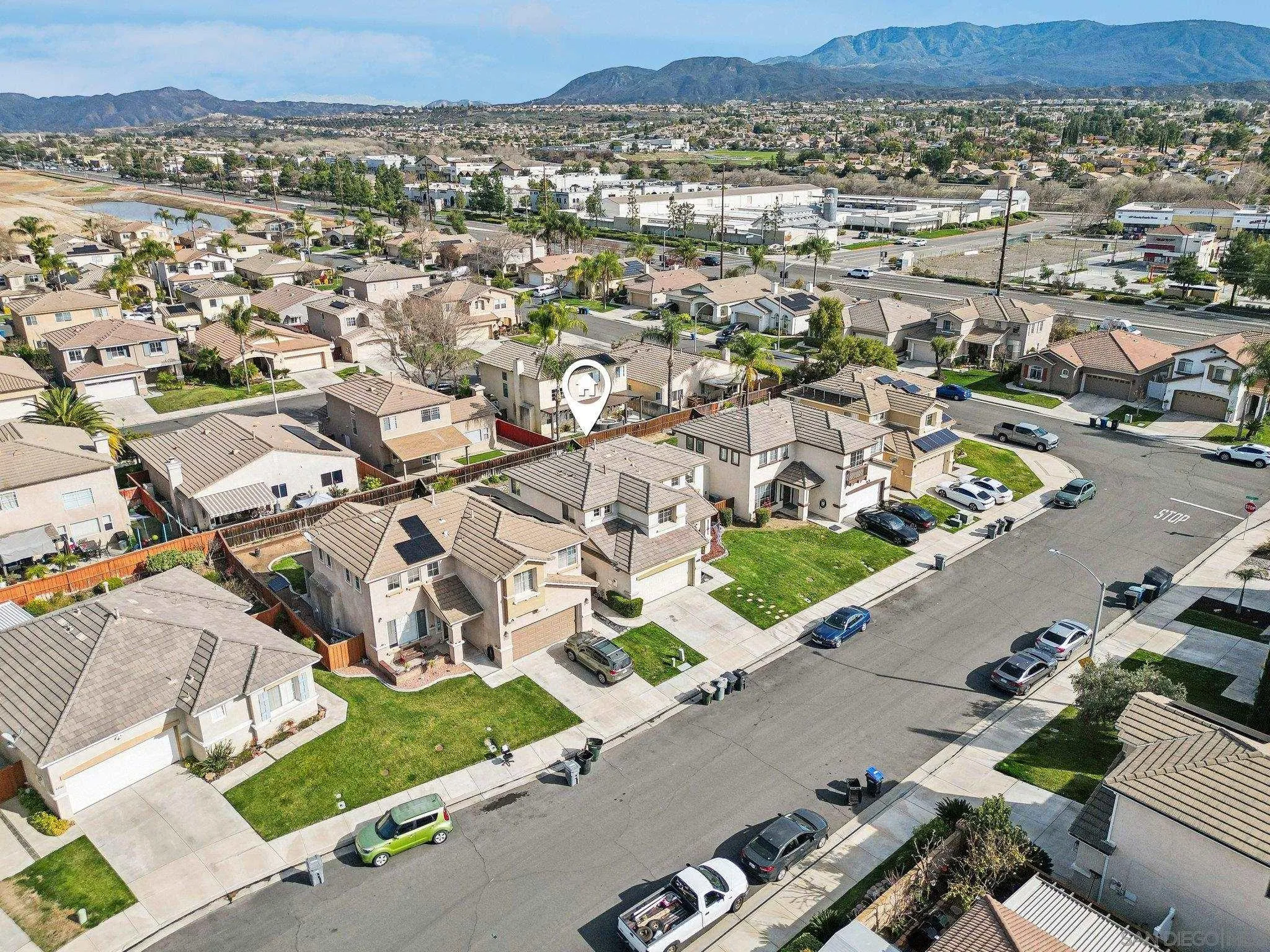 43166 Sereno Drive Temecula, CA 92592 - Photo 44 of 44 an aerial view of a city with streets and houses