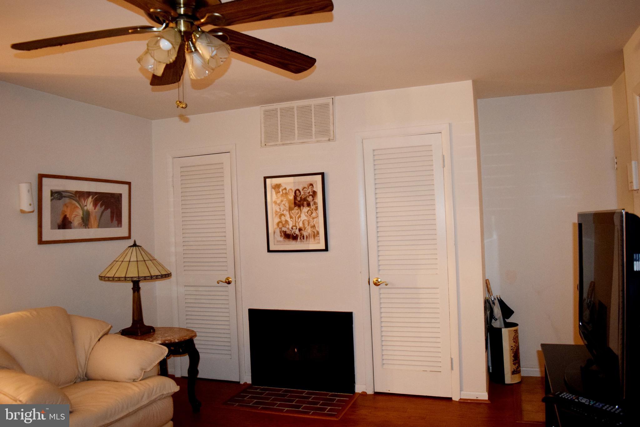 2123 Young Street Southeast, Unit 203 Washington, DC 20020 - Photo 9 of 10 a view of a livingroom with furniture and a ceiling fan