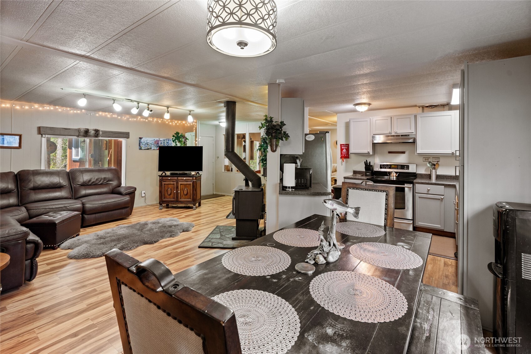 271 Skate Creek Road North Ashford, WA 98304 - Photo 7 of 40 a kitchen with a table and chairs in it