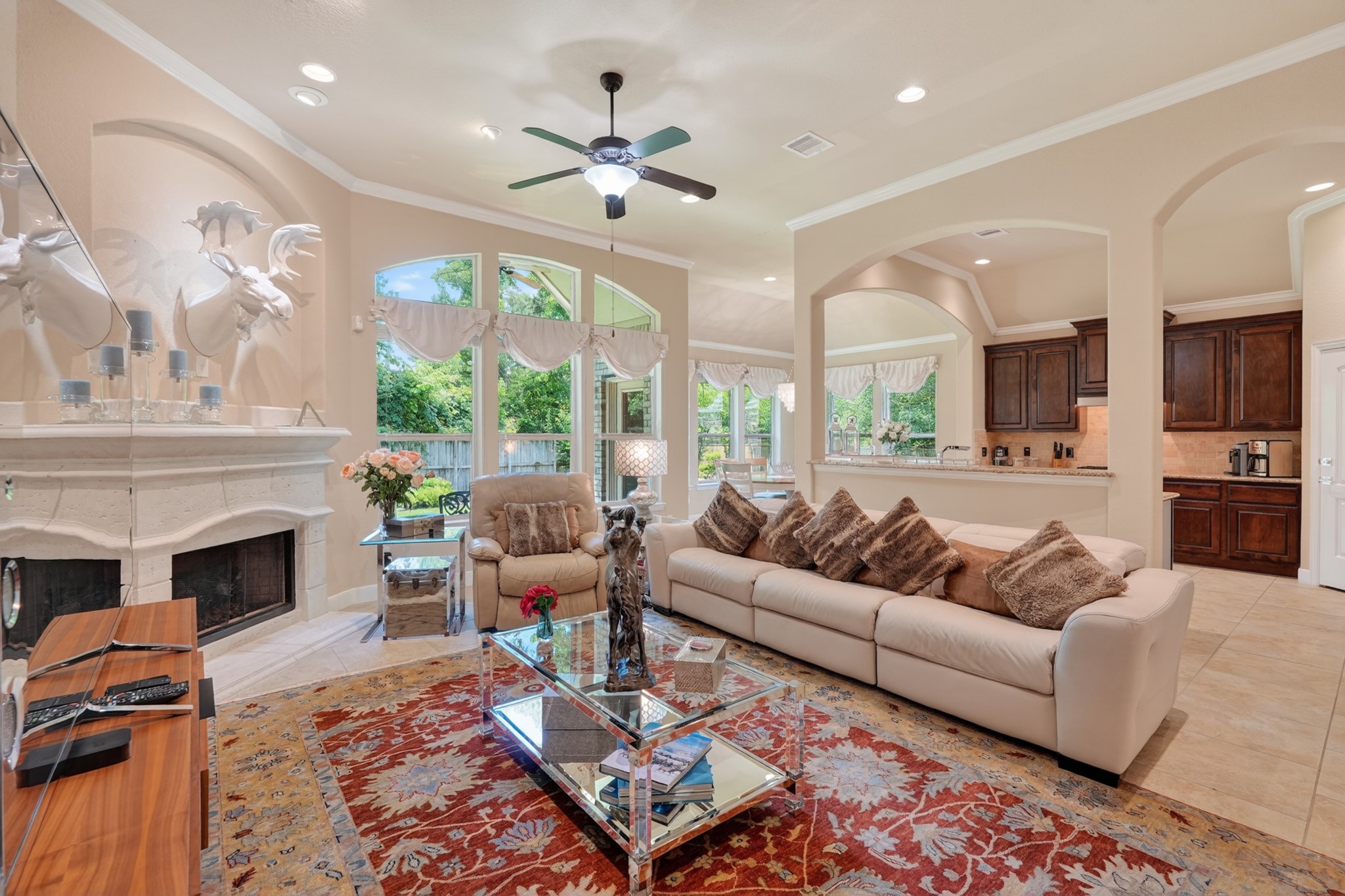 55 South Victoriana Circle Spring, TX 77389 - Photo 1 of 40 a living room with furniture fireplace and a large window