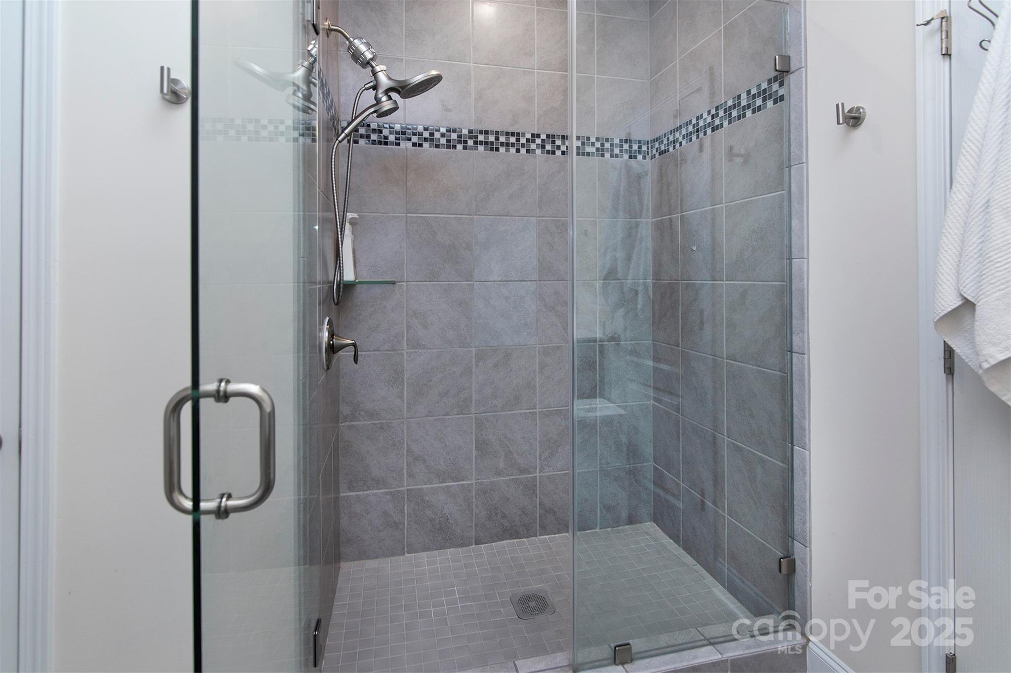 938 Moose Trail Matthews, NC 28104 - Photo 14 of 23 a bathroom with a shower